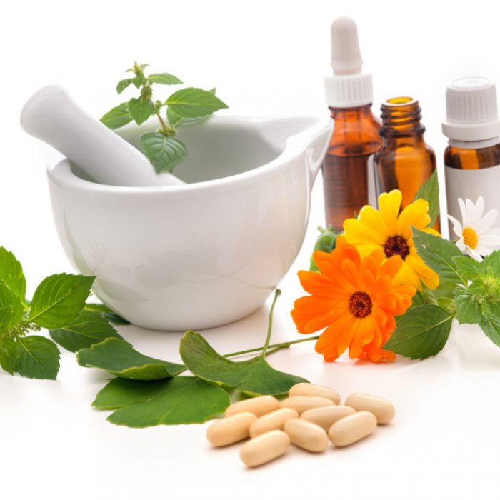 Healing herbs and amortar. Alternative medicine concept